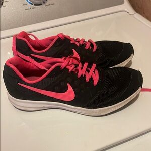 Nike Black and Pink Athletic Shoes with Mesh Upper